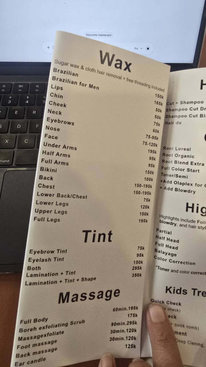 Original brochure with waxing, tinting and massage prices